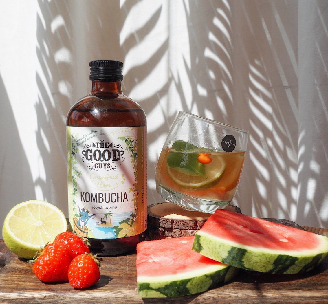 the good guys kombucha grapefruit hops stillife with spa water, berries and watermelon slices